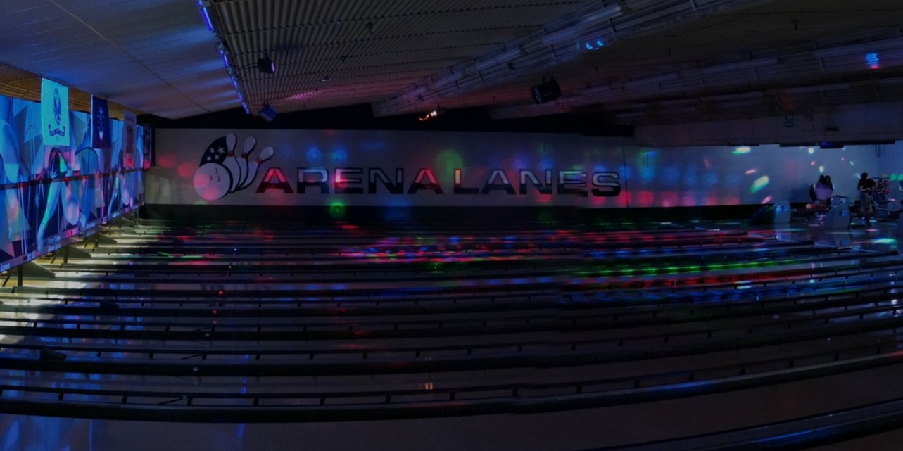 Arena Lanes panoramic interior with lanes and neon lighting